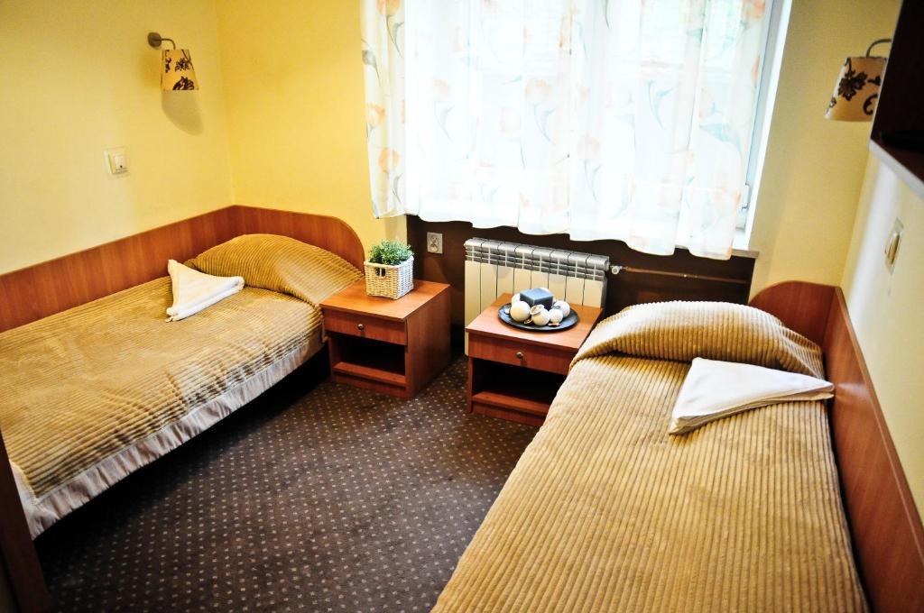 Osrodek Uslug Hotelarskich Kinga ヴィエリチカ 部屋 写真